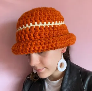 Handmade burnt orange chunky crochet bowler hat with cream stripe