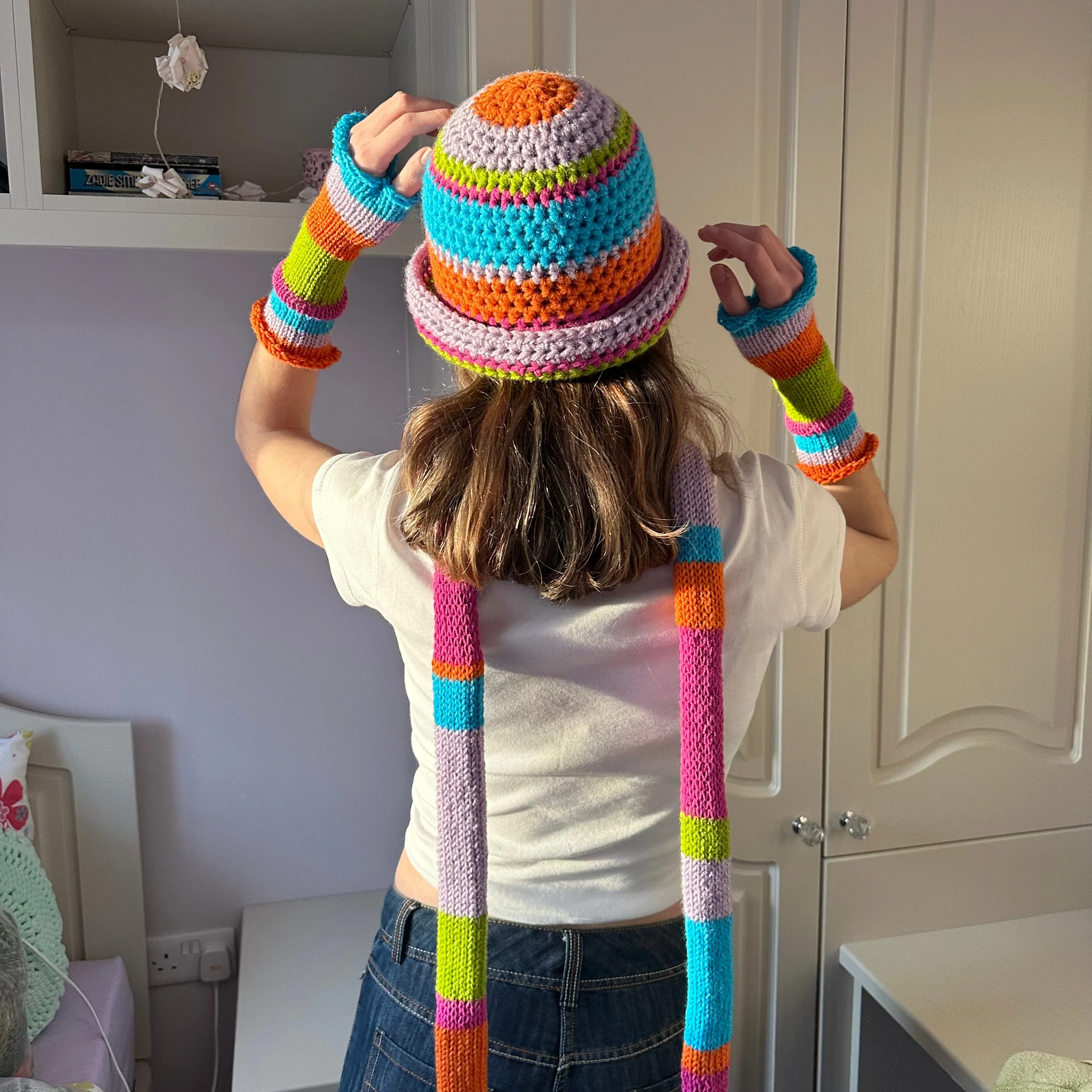 Handmade knitted rainbow striped hand warmers