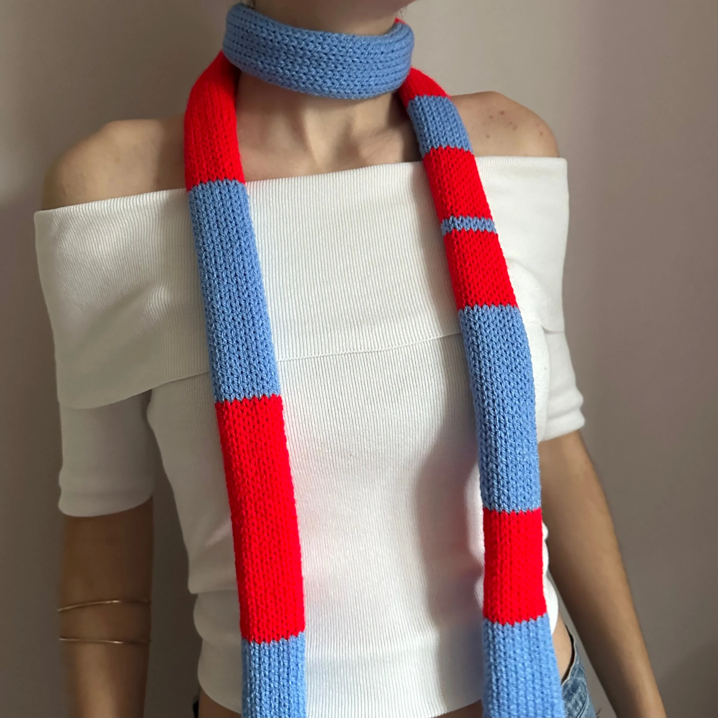 Handmade knitted stripy skinny scarf in red and blue